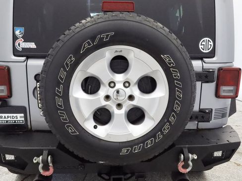 Used 2013 Jeep Wrangler Unlimited Sahara w/ Dual Top Group AWD/4WD image 16