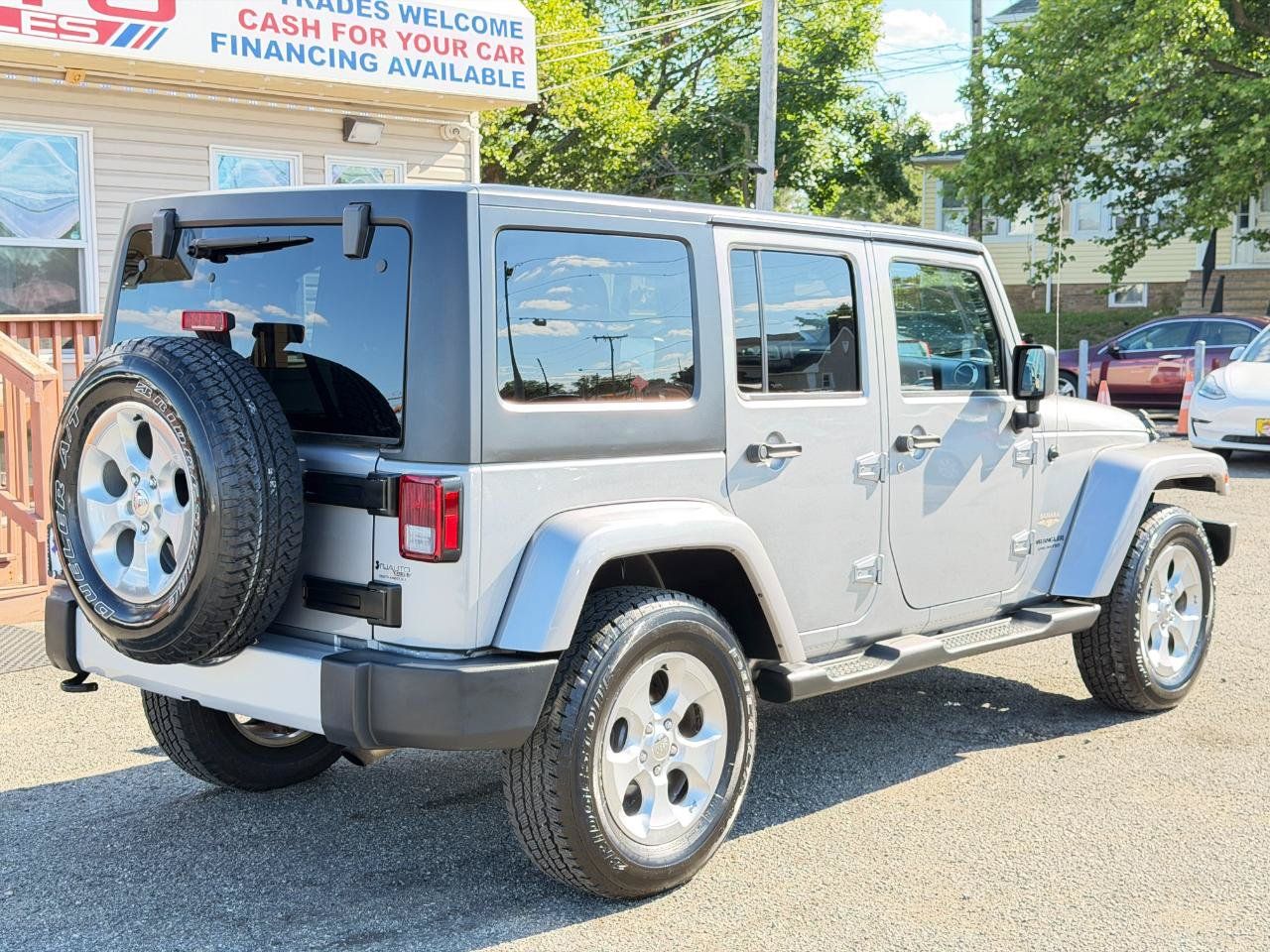 Used 2015 Jeep Wrangler Unlimited Sahara w/ Dual Top Group AWD/4WD image 4