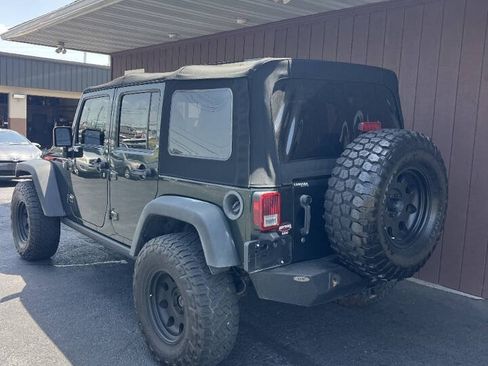 Used 2011 Jeep Wrangler Unlimited Rubicon w/ Dual Top Group AWD/4WD image 3