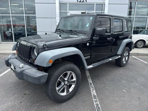 Used 2011 Jeep Wrangler Unlimited Sport AWD/4WD image 1