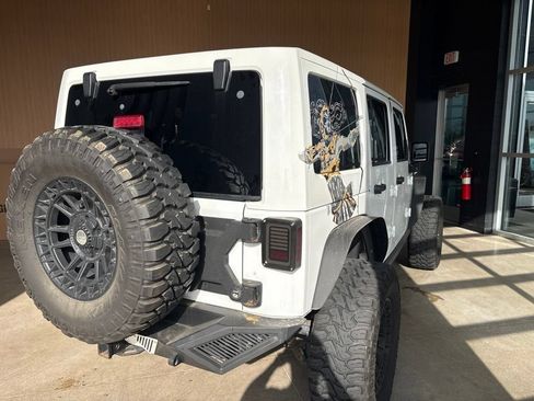 Used 2011 Jeep Wrangler Unlimited Sahara w/ Mopar Chrome Edition Group AWD/4WD image 13