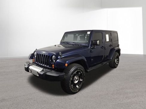 Used 2013 Jeep Wrangler Unlimited Sahara w/ Trailer Tow Group AWD/4WD image 2