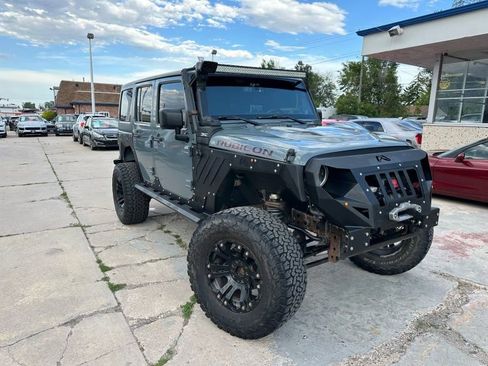 Used 2014 Jeep Wrangler Unlimited Rubicon w/ Connectivity Group AWD/4WD image 1