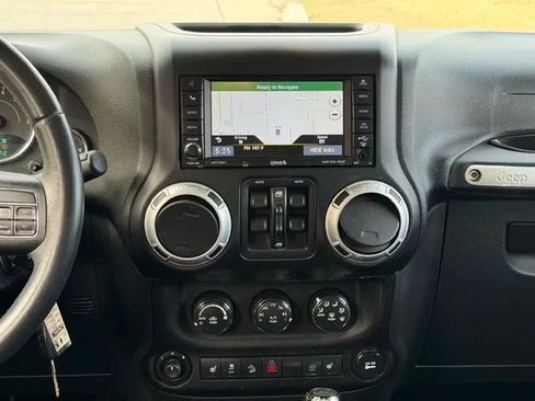 Used 2013 Jeep Wrangler Unlimited Sahara w/ Dual Top Group AWD/4WD image 12