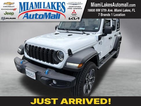Used 2024 Jeep Wrangler Unlimited w/ Dual Top Group AWD/4WD image 1