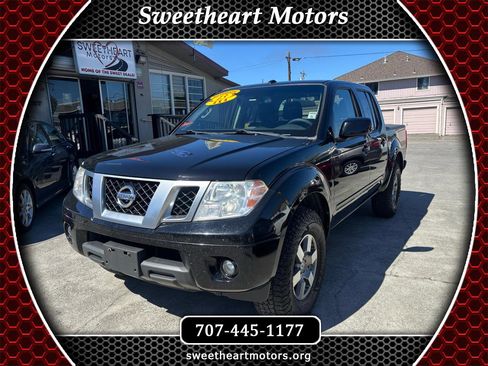 Used 2013 Nissan Frontier PRO-4X image 1