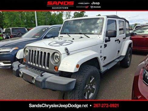 Used 2013 Jeep Wrangler Unlimited Sport AWD/4WD image 1