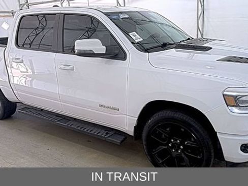 Used 2023 RAM 1500 Laramie AWD/4WD image 1