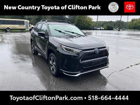 Used 2021 Toyota RAV4 SE w/ Weather & Moonroof Package AWD/4WD image 1