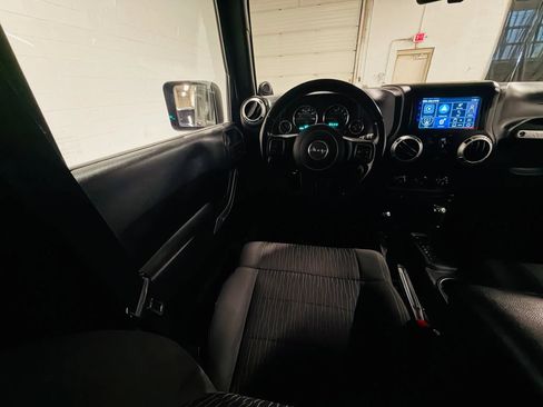 Used 2011 Jeep Wrangler Unlimited Sahara w/ Dual Top Group AWD/4WD image 14