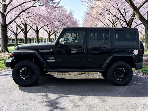 Used 2011 Jeep Wrangler Unlimited Sahara w/ Mopar Chrome Edition Group AWD/4WD image 4
