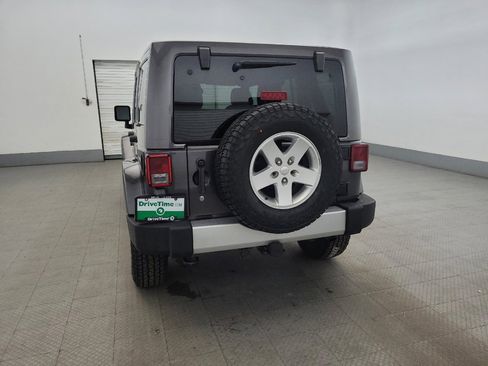 Used 2014 Jeep Wrangler Unlimited Sahara w/ Dual Top Group AWD/4WD image 6