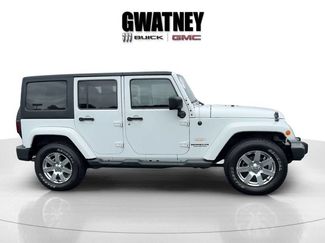 Used 2014 Jeep Wrangler Unlimited Sahara w/ Max Tow Package AWD/4WD video 2