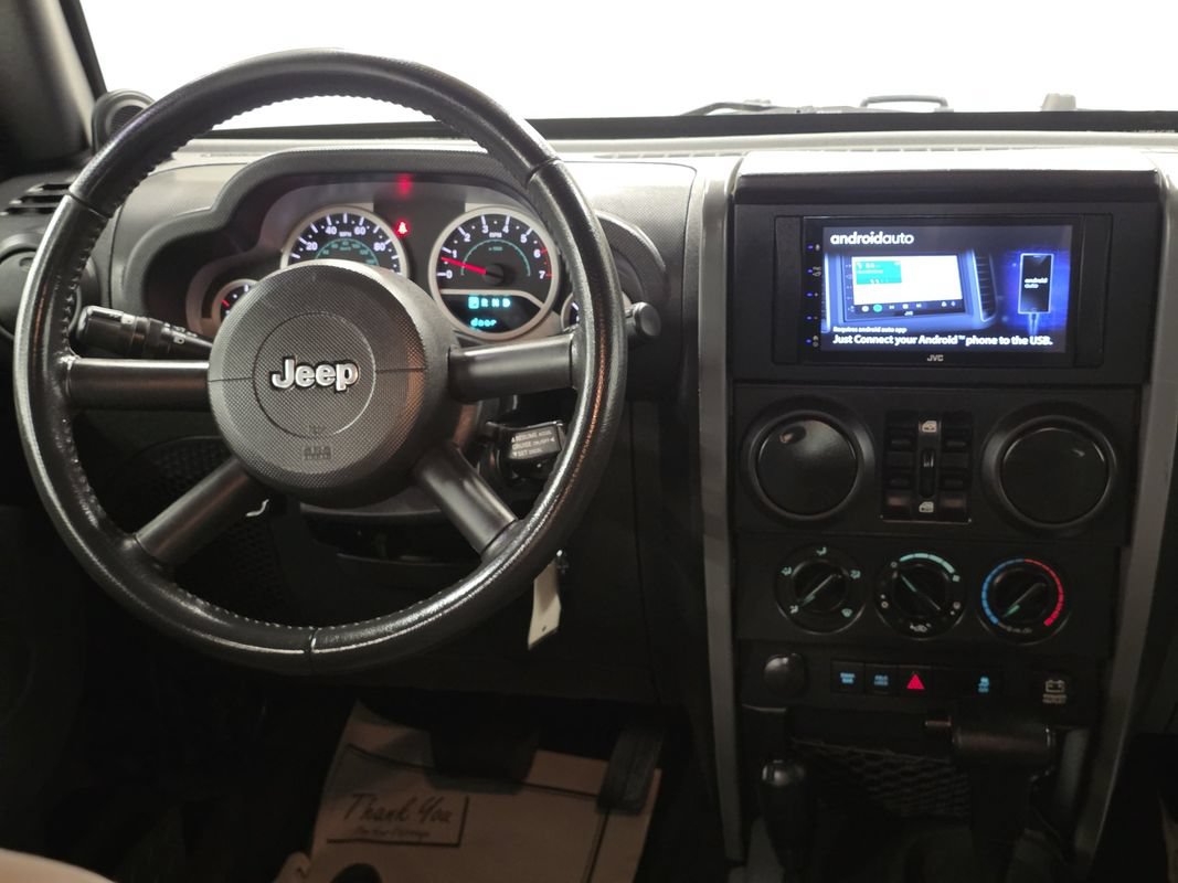Used 2010 Jeep Wrangler Unlimited Rubicon w/ Dual Top Group AWD/4WD image 19