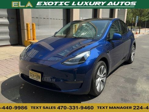 Used 2024 Tesla Model Y Long Range AWD/4WD image 1