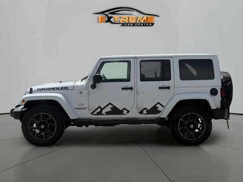 Used 2012 Jeep Wrangler Unlimited Sahara w/ Dual Top Group AWD/4WD image 3