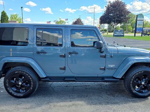 Used 2014 Jeep Wrangler Unlimited Sahara w/ Dual Top Group AWD/4WD image 7