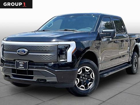 Used 2023 Ford F150 Lightning XLT AWD/4WD image 1