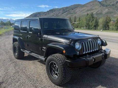 Used 2016 Jeep Wrangler Unlimited Sahara w/ Connectivity Group AWD/4WD image 1