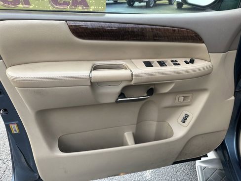 Used 2011 Nissan Armada Platinum w/ 2nd Row Captain Seat Pkg image 13
