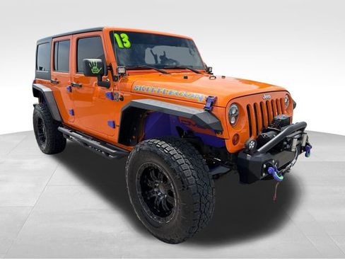 Used 2013 Jeep Wrangler Unlimited Rubicon w/ Dual Top Group AWD/4WD image 1