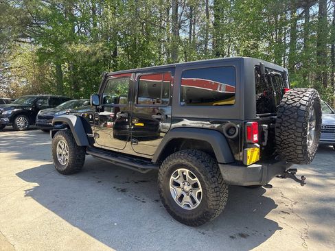 Used 2014 Jeep Wrangler Unlimited Rubicon w/ Dual Top Group image 8