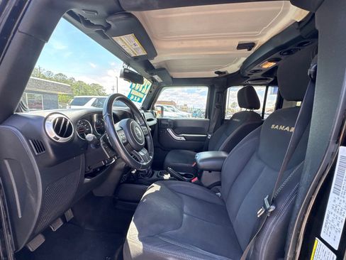 Used 2013 Jeep Wrangler Unlimited Sahara w/ Mopar Chrome Edition Group AWD/4WD image 12