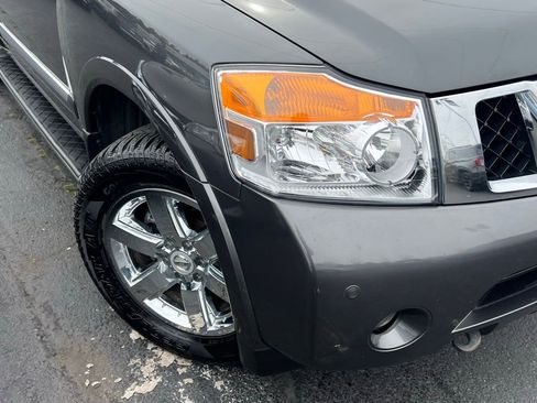 Used 2011 Nissan Armada Platinum w/ 2nd Row Captain Seat Pkg image 2