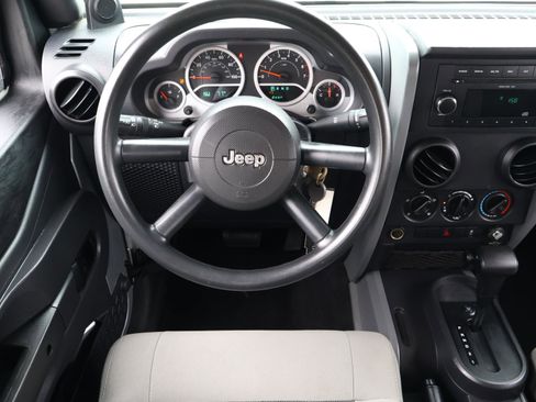 Used 2010 Jeep Wrangler Unlimited Sport w/ Black Appearance Group image 9