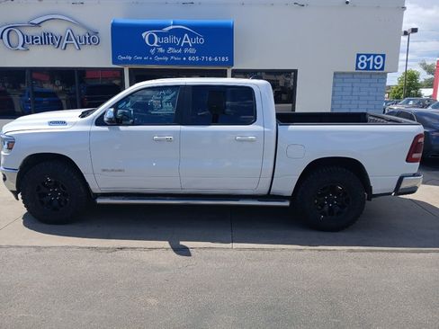 Used 2023 RAM 1500 Laramie AWD/4WD image 1