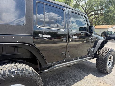 Used 2012 Jeep Wrangler Unlimited Sahara w/ Mopar Chrome Edition Group AWD/4WD image 5