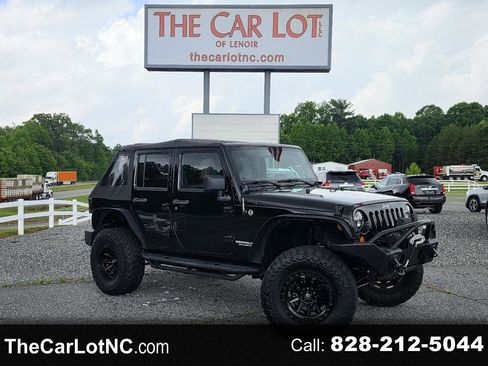 Used 2012 Jeep Wrangler Unlimited Sahara AWD/4WD image 1