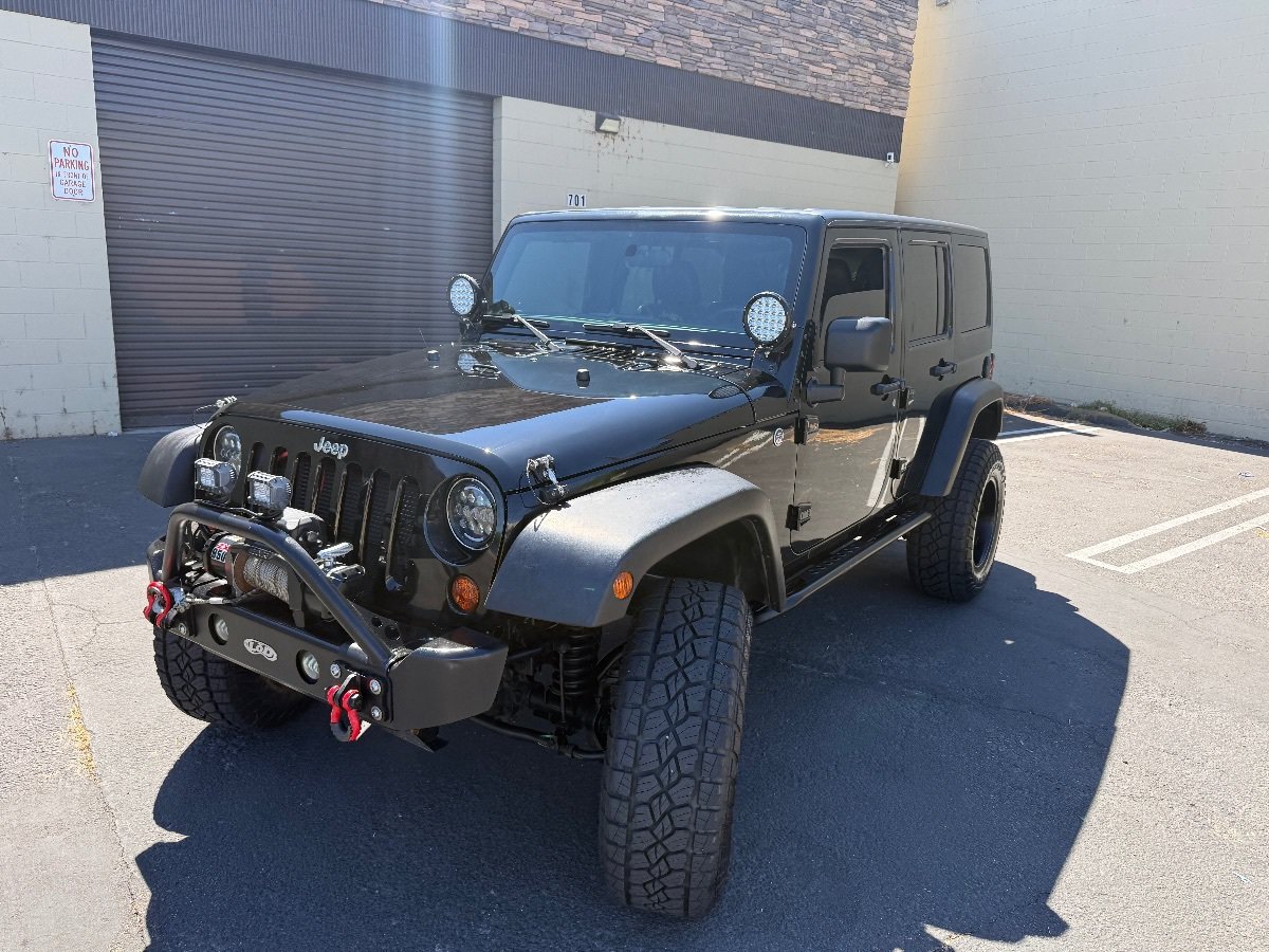 Used 2012 Jeep Wrangler Unlimited Sport w/ Max Tow Pkg AWD/4WD image 5