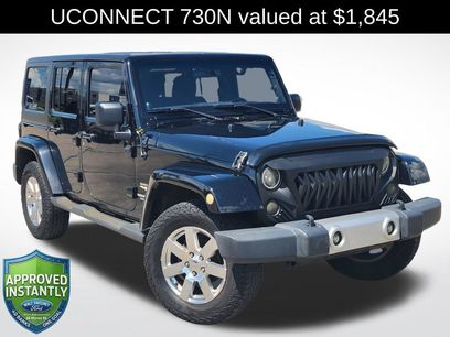 Used 2012 Jeep Wrangler Unlimited Sahara w/ Dual Top Group