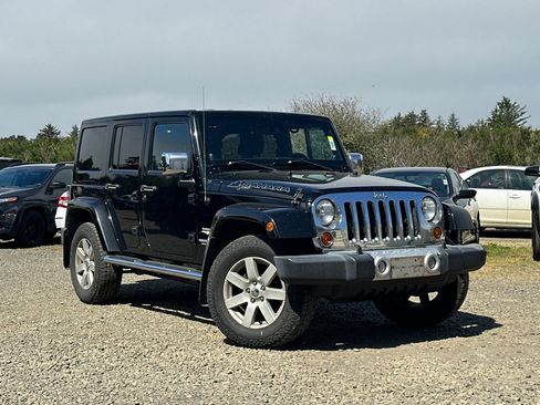Used 2012 Jeep Wrangler Unlimited Sahara w/ Mopar Chrome Edition Group AWD/4WD image 2
