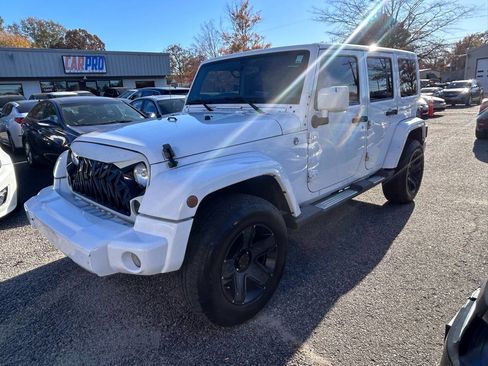 Used 2013 Jeep Wrangler Unlimited Sahara w/ Dual Top Group image 2
