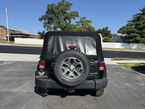 Used 2014 Jeep Wrangler Unlimited Rubicon w/ Dual Top Group AWD/4WD image 4