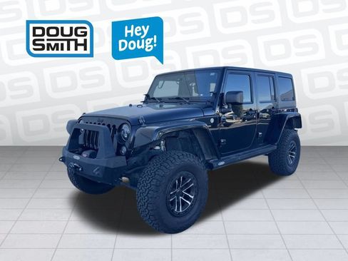 Used 2014 Jeep Wrangler Unlimited Rubicon w/ Connectivity Group AWD/4WD image 1