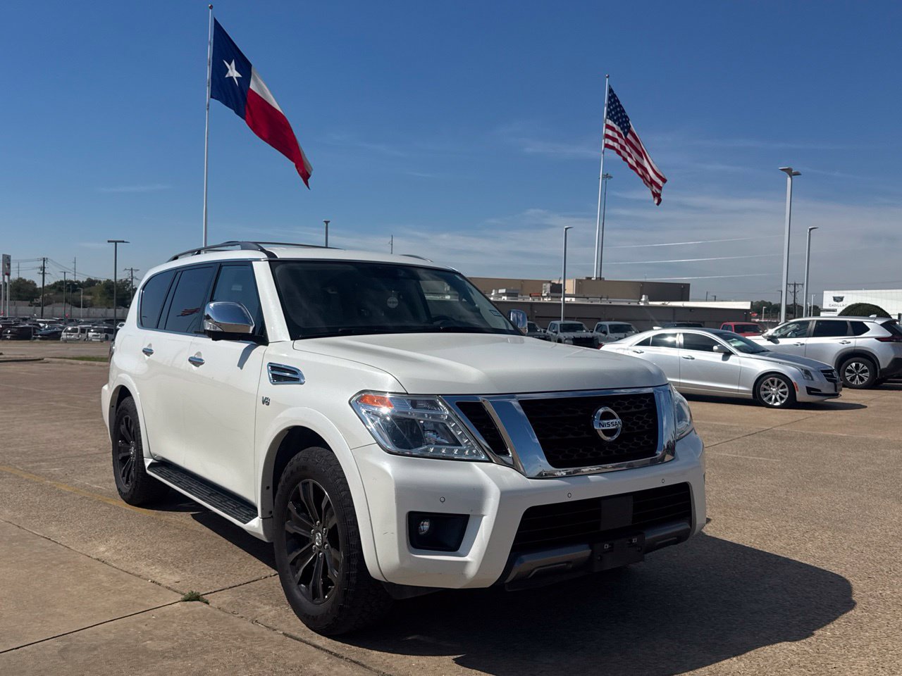 Used 2019 Nissan Armada Platinum w/ Captain's Chairs Package RWD image 2