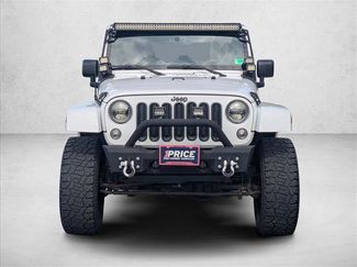 Used 2015 Jeep Wrangler Unlimited Sahara w/ Max Tow Package AWD/4WD video 2
