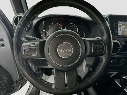 Used 2014 Jeep Wrangler Unlimited Sahara w/ Dual Top Group AWD/4WD image 13