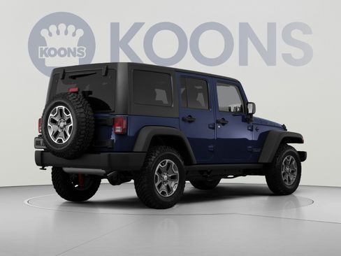 Used 2013 Jeep Wrangler Unlimited Sahara w/ Dual Top Group AWD/4WD image 4