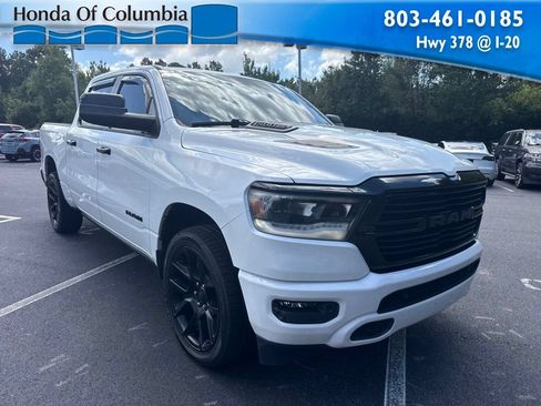 Used 2023 RAM 1500 Laramie AWD/4WD image 1