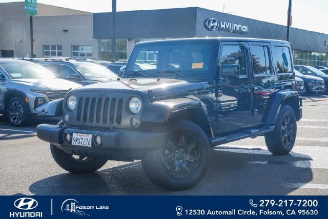 Used 2014 Jeep Wrangler Unlimited Sahara AWD/4WD image 1
