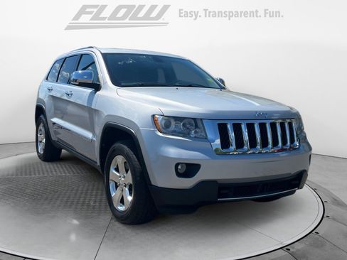Used 2013 Jeep Grand Cherokee Overland w/ Advance Technology Group AWD/4WD image 1