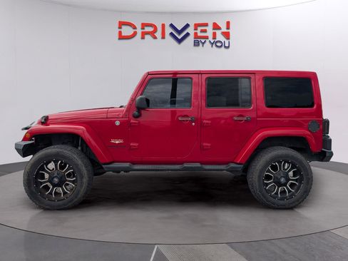 Used 2014 Jeep Wrangler Unlimited Sahara w/ Dual Top Group AWD/4WD image 2
