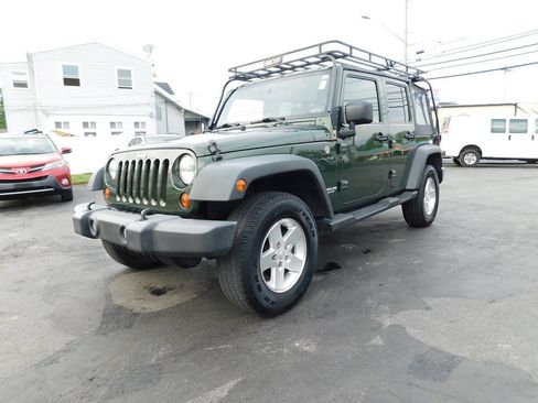 Used 2009 Jeep Wrangler Unlimited Rubicon w/ Trailer Tow Group AWD/4WD image 1