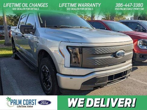Certified 2023 Ford F150 Lightning XLT AWD/4WD image 1