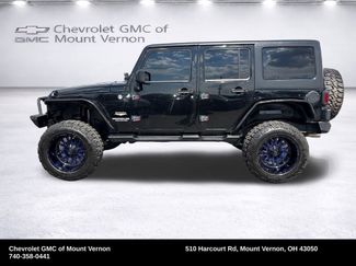 Used 2012 Jeep Wrangler Unlimited Sahara w/ Dual Top Group AWD/4WD video 2
