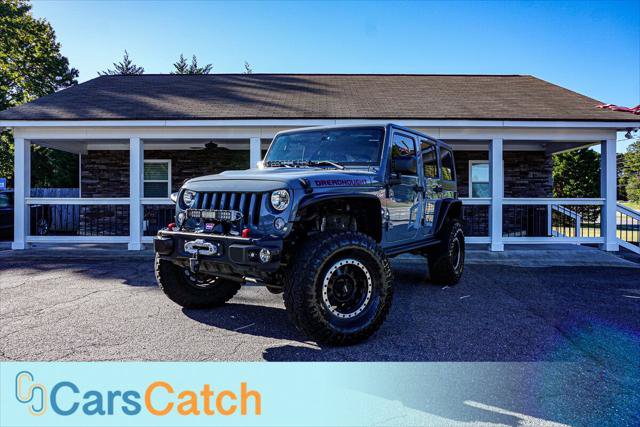 Used 2015 Jeep Wrangler Unlimited Rubicon AWD/4WD image 1